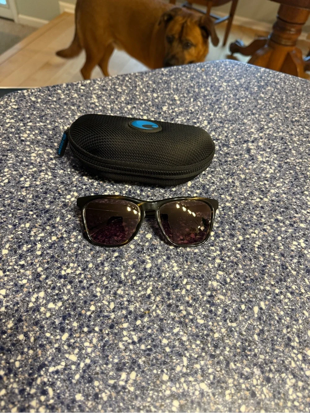 Costa Women’s Black Sunglasses with Purple-Tinted Lenses